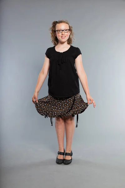 Happy funny teenage girl with curly blonde hair. — Stock Photo, Image