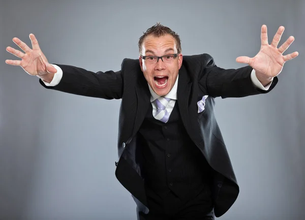 Angry confused screaming young business man — Stock Photo, Image