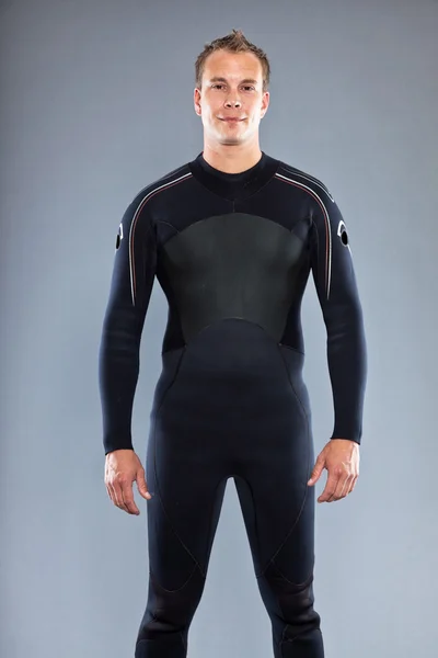 Man with short hair wearing wetsuit. — Stock Photo, Image