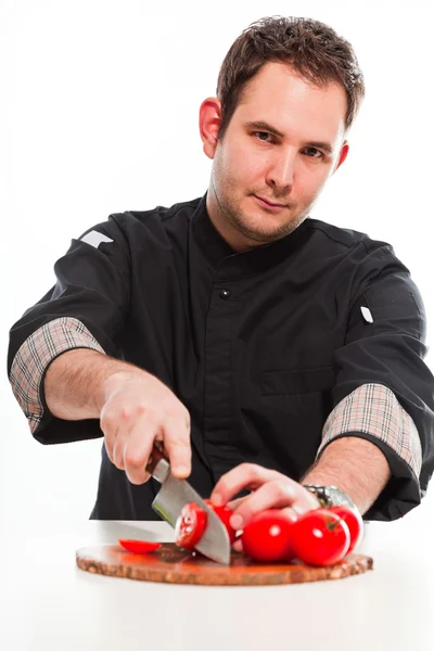 Cozinheiro corte de ingredientes crus . — Fotografia de Stock