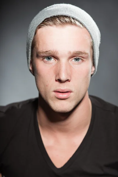 Winter fashion studio portrait of urban young man. — Stock Photo, Image