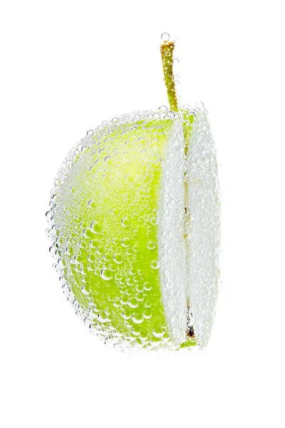 Fresh green apple with water bubbles isolated on white background. — Stock Photo, Image