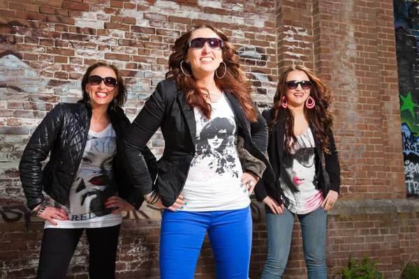 Three pretty young women in urban fashion style. — Stock Photo, Image