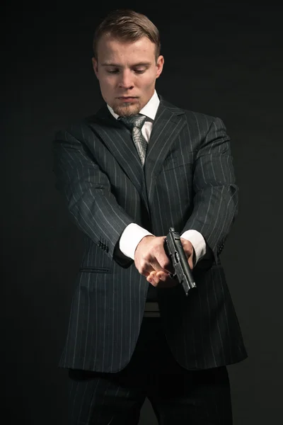 Mafia uomo con pistola . Foto Stock Royalty Free