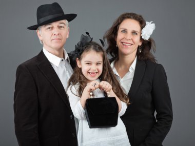 Aile babası, annesi ve kızı.