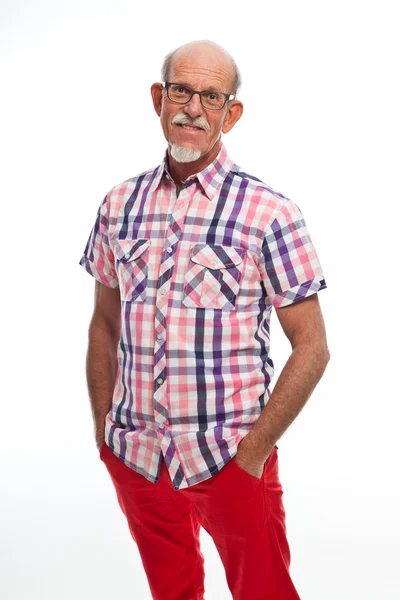 アクティブ シニアよくのスタジオ ポートレートを着て引退した男. — ストック写真