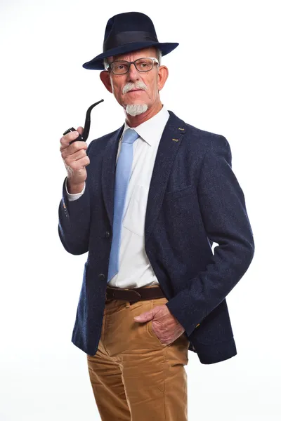 Studio portrait of active senior well dressed retired man. — Stock Photo, Image