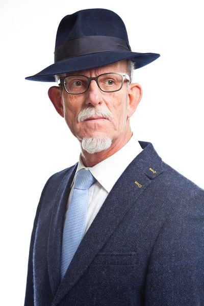 Studio portrait of active senior well dressed retired man. — Stock Photo, Image