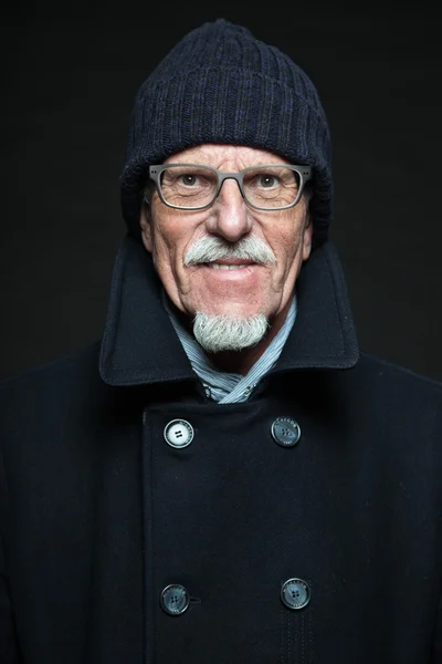 Studio portrait of active senior well dressed retired man. — Stock Photo, Image