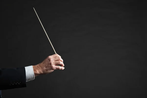 Hand des Dirigenten in Aktion. — Stockfoto