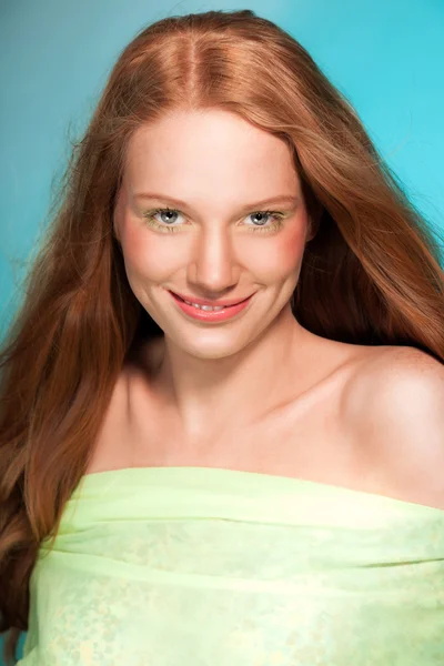 Beauty portrait of smiling woman with red hair. — Stock Photo, Image