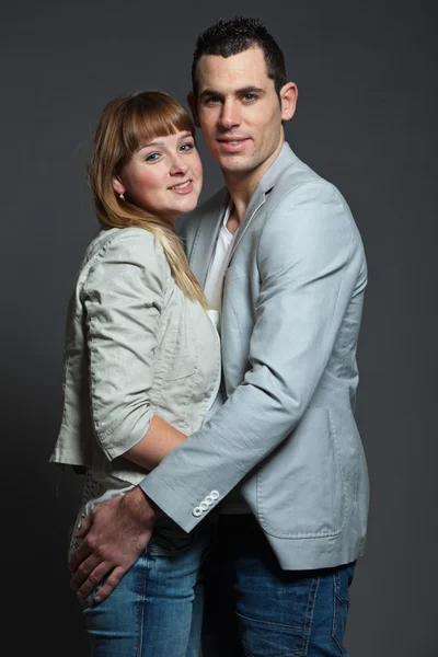 Young couple man and woman in love. Studio shot. — Stock Photo, Image