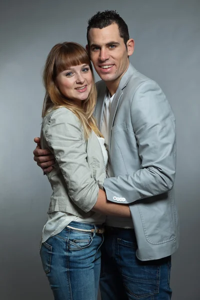 Young couple man and woman in love. Studio shot. — Stock Photo, Image