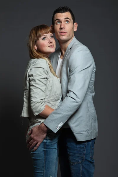 Young couple man and woman in love. Studio shot. — Stock Photo, Image