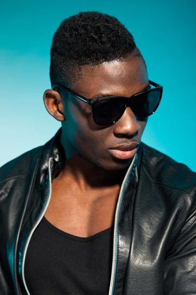 Cool urban stylish black american man. Fashion studio shot. — Stock Photo, Image