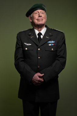 US military general wearing beret. Studio portrait. clipart