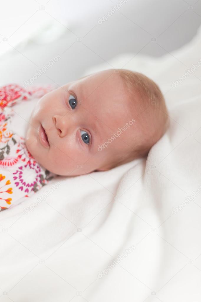Cute Baby With Blonde Hair And Blue Eyes Studio Shot Stock