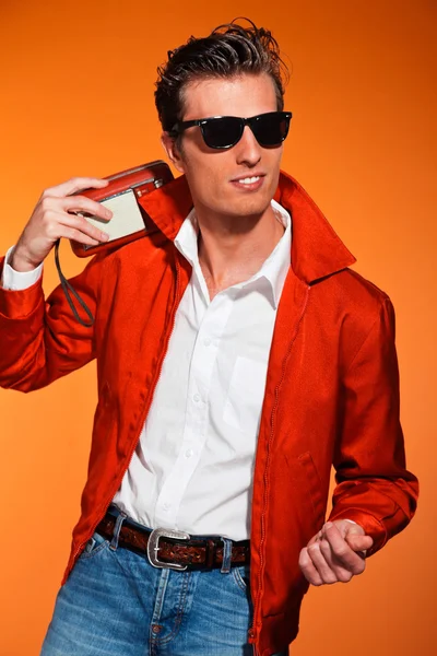 Retro fifties style man with sunglasses. Listening to radio. Reb — Stock Photo, Image