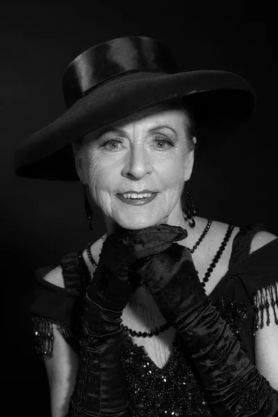 Vintage glamour studio portrait of senior woman. Black and white — Stock Photo, Image