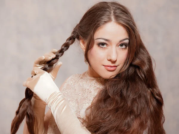 Vintage romantic fashion brunette woman. Doing her hair. Marble — Stock Photo, Image