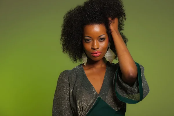 Sensual retro seventies fashion afro woman with green dress. Gre — Stock Photo, Image