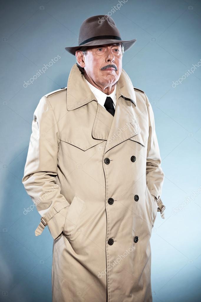 Retro detective man with mustache and Wearing Stu