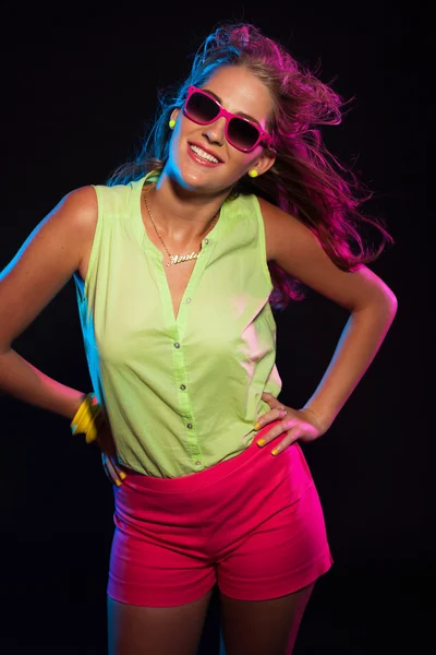 Sexy retro 80s fashion disco girl with long blonde hair and pink — Stock Photo, Image