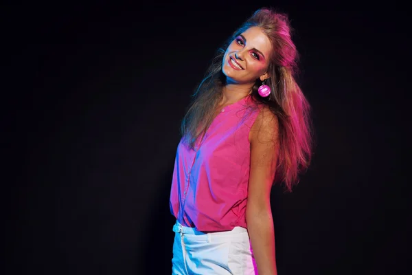 Happy retro 80s fashion disco girl with long blonde hair. Black — Stock Photo, Image