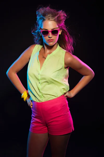 Sexy retro 80s fashion disco girl with long blonde hair and pink — Stock Photo, Image