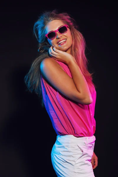 Sexy retro 80s fashion disco girl with long blonde hair and sung — Stock Photo, Image