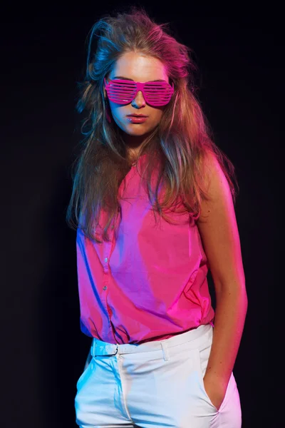 Sexy retro 80s fashion disco girl with long blonde hair and pink — Stock Photo, Image