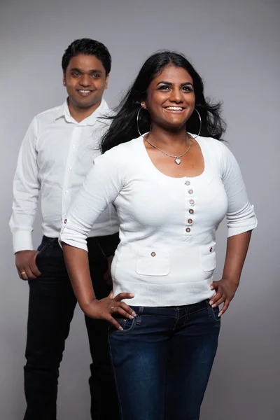 Young romantic indian couple. Wearing white shirt and jeans. Stu — Stock Photo, Image