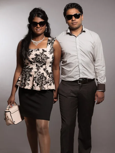 Fashionable indian couple walking towards camera. Wearing retro — Stock Photo, Image