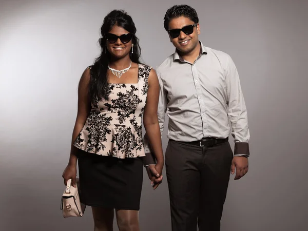 Fashionable indian couple walking towards camera. Wearing retro — Stock Photo, Image