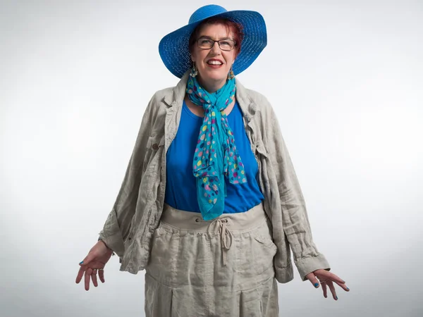 Happy smiling middle aged woman with red short hair and glasses. — Stock Photo, Image