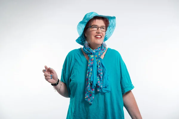 Happy smiling middle aged woman with red short hair and glasses. — Stock Photo, Image