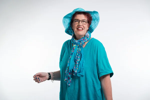 Happy smiling middle aged woman with red short hair and glasses. — Stock Photo, Image