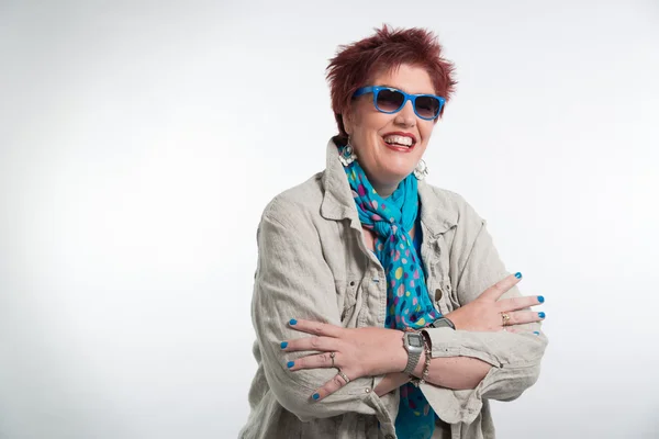 Happy smiling middle aged woman with red short hair. Wearing sun — Stock Photo, Image