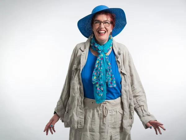 Happy smiling middle aged woman with red short hair and glasses. — Stock Photo, Image