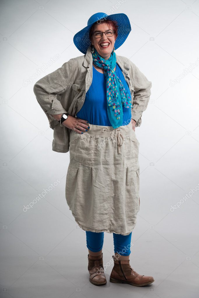 Happy Smiling Middle Aged Woman With Red Short Hair And Glasses