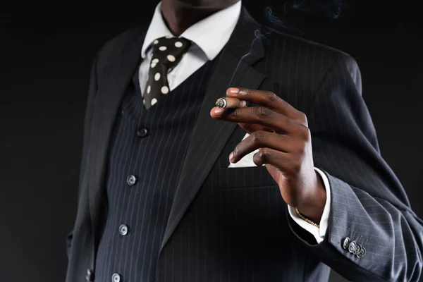 Close-up of hand of retro african american mafia man wearing str — Stock Photo, Image