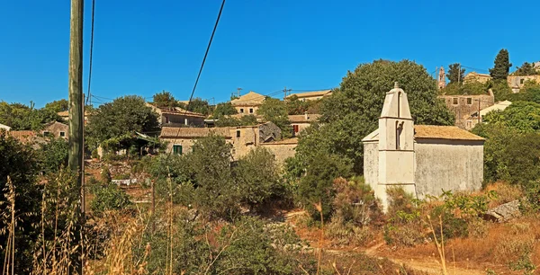 Panoramic shot of the oldest village of Corfu island. Blue sky. — Stock Photo, Image