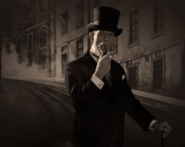 adam 1900 tarzı siyah şapka ve paltosunu giyen bir pipo. Dicken