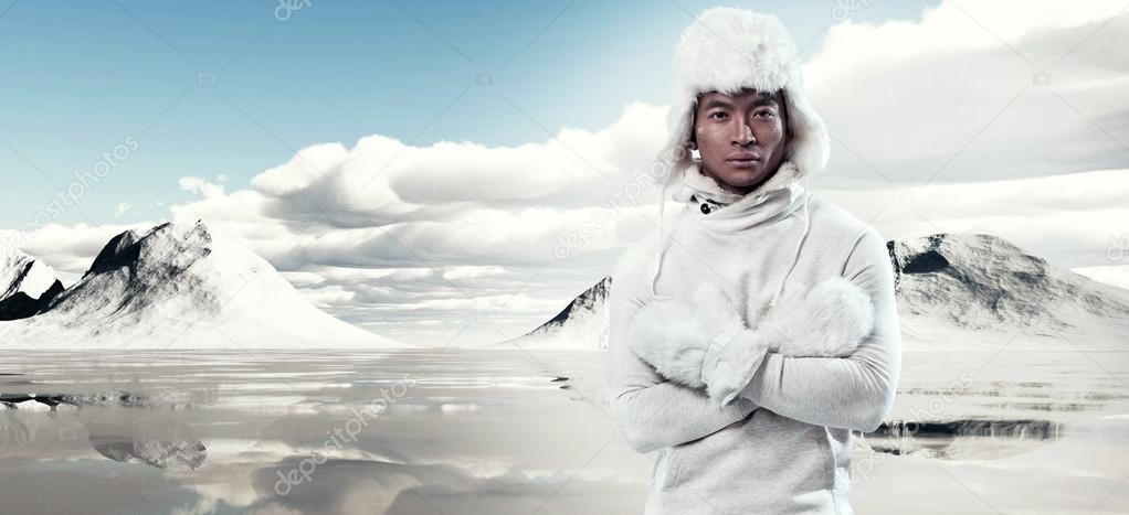 Asian winter fashion man in snow mountain Wearing whi