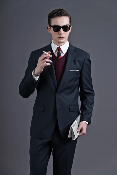 Retro fifties fashion young businessman with black sunglasses we — Stock Photo, Image