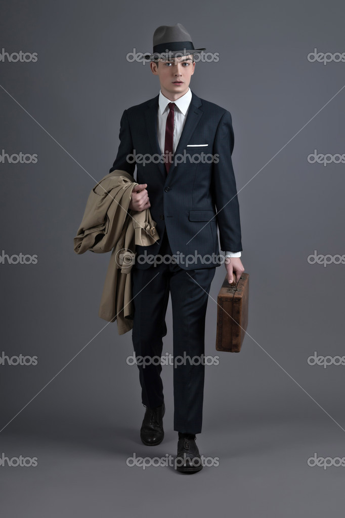 Bemærk sjældenhed Permanent Retro fashion fifties young businessman with hat wearing dark su Stock  Photo by ©ysbrand 38073529