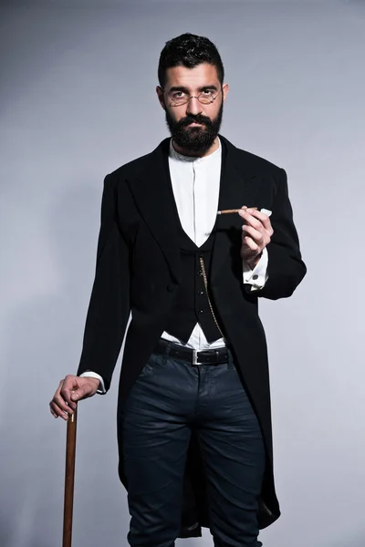 Retro hipster 1900 mode man met zwart haar en baard. di — Stockfoto