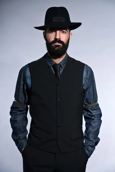 Retro hipster 1900 fashion man in suit with black hair and beard — Stock Photo, Image