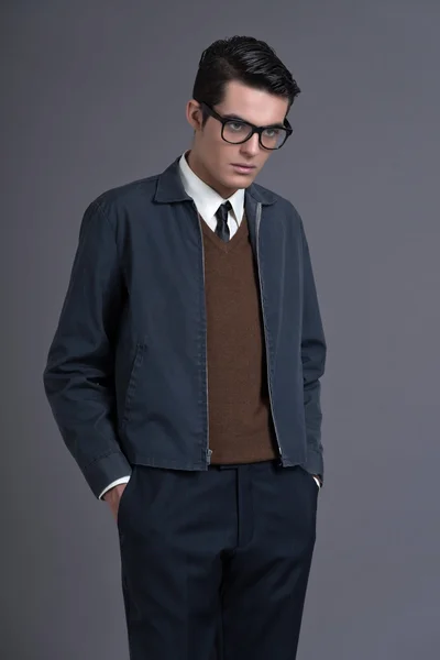 Retro fifties fashion man with dark grease hair. Wearing brown s — Stock Photo, Image