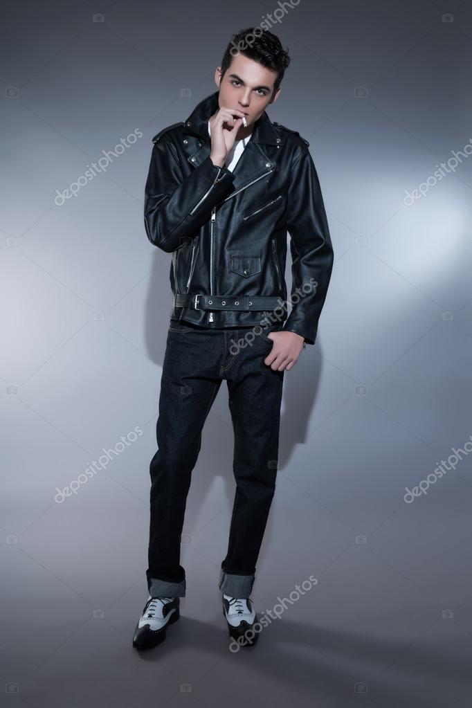 Retro rock and roll 50s fashion man with dark grease hair. Smoki Stock  Photo by ©ysbrand 39267143